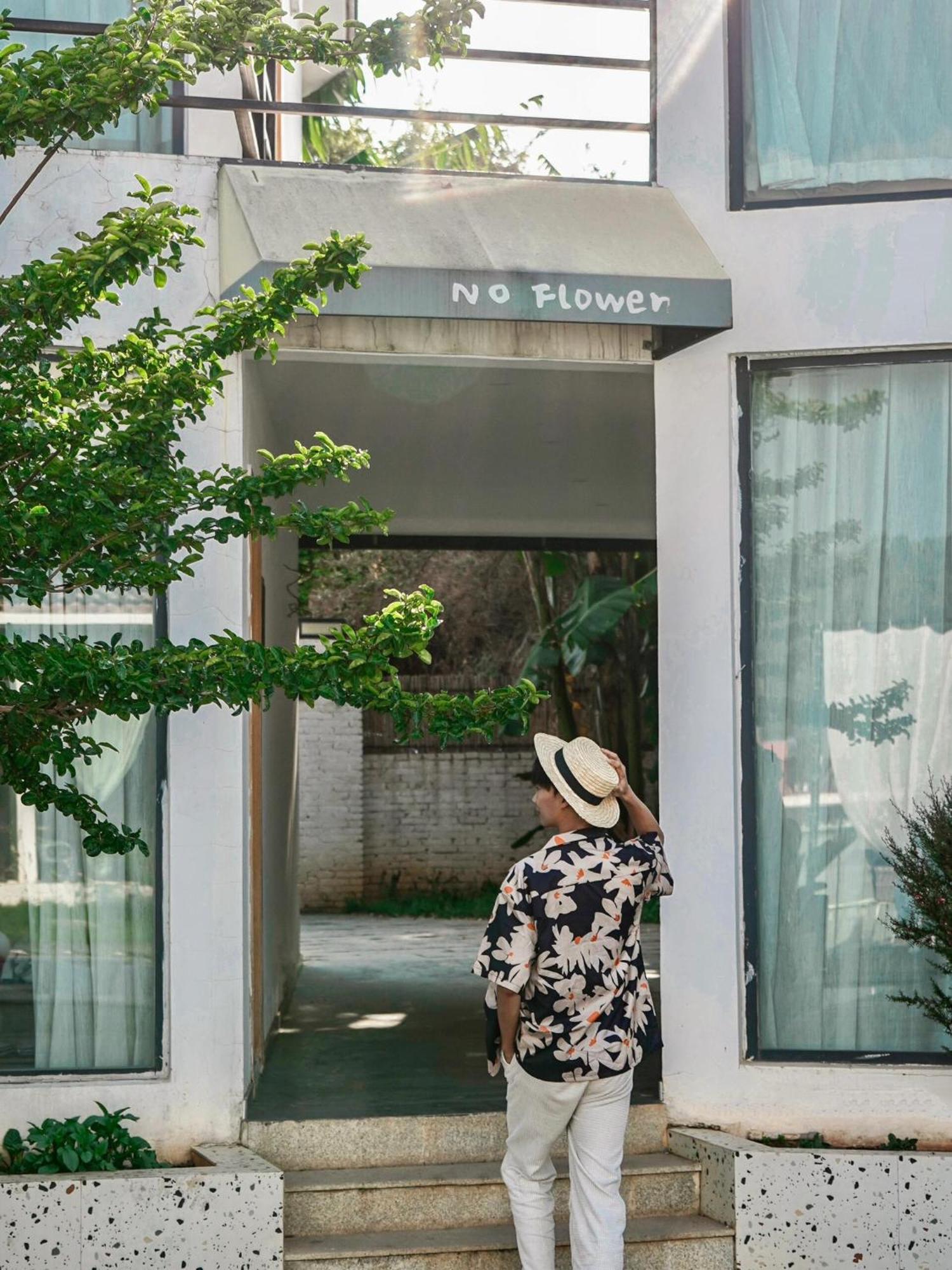 No Flowers Boutique Hostel Kunming Bagian luar foto